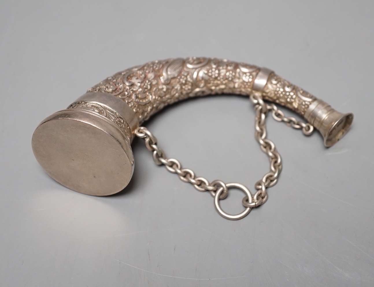 A Victorian novelty silver combination vinaigrette/scent flask, by Sampson Mordan & Co, Birmingham, 1894, 10.7cm, embossed with birds amid scrolls.